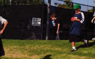 Boys running in park