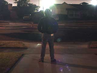 Silhouette of man on street